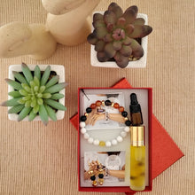 Load image into Gallery viewer, Joyful aromatherapy Intention Set, with diffuser bracelet, earrings, and essential oil. Using Carnelian, Howlite, Tourmaline, Smokey Quartz, Citrine and lava rock.